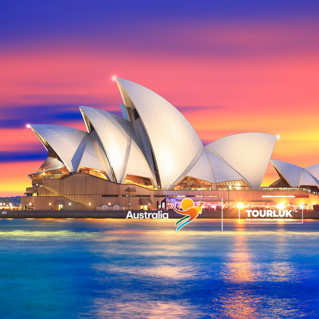 Nhà hát Opera Sydney tại Sydney, Úc với kiến trúc cánh buồm độc đáo bên bến cảng lúc hoàng hôn.